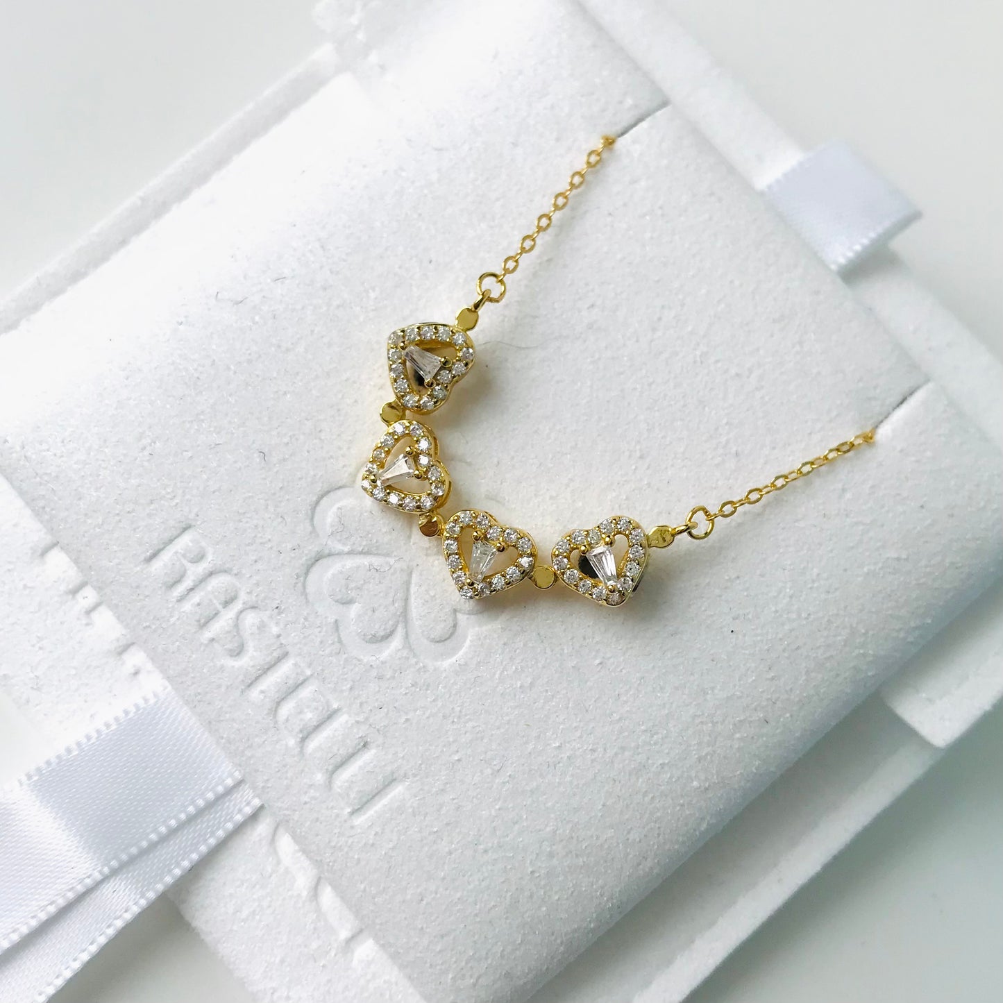 Collier pendentif plaqué or et zircon